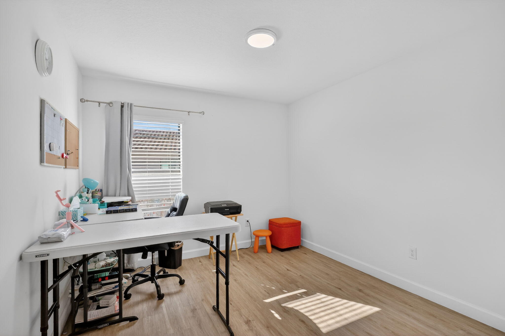 1011 Willow Place Riviera Beach, FL 33410 - Photo 29 of 65 a view of a workspace with furniture and window