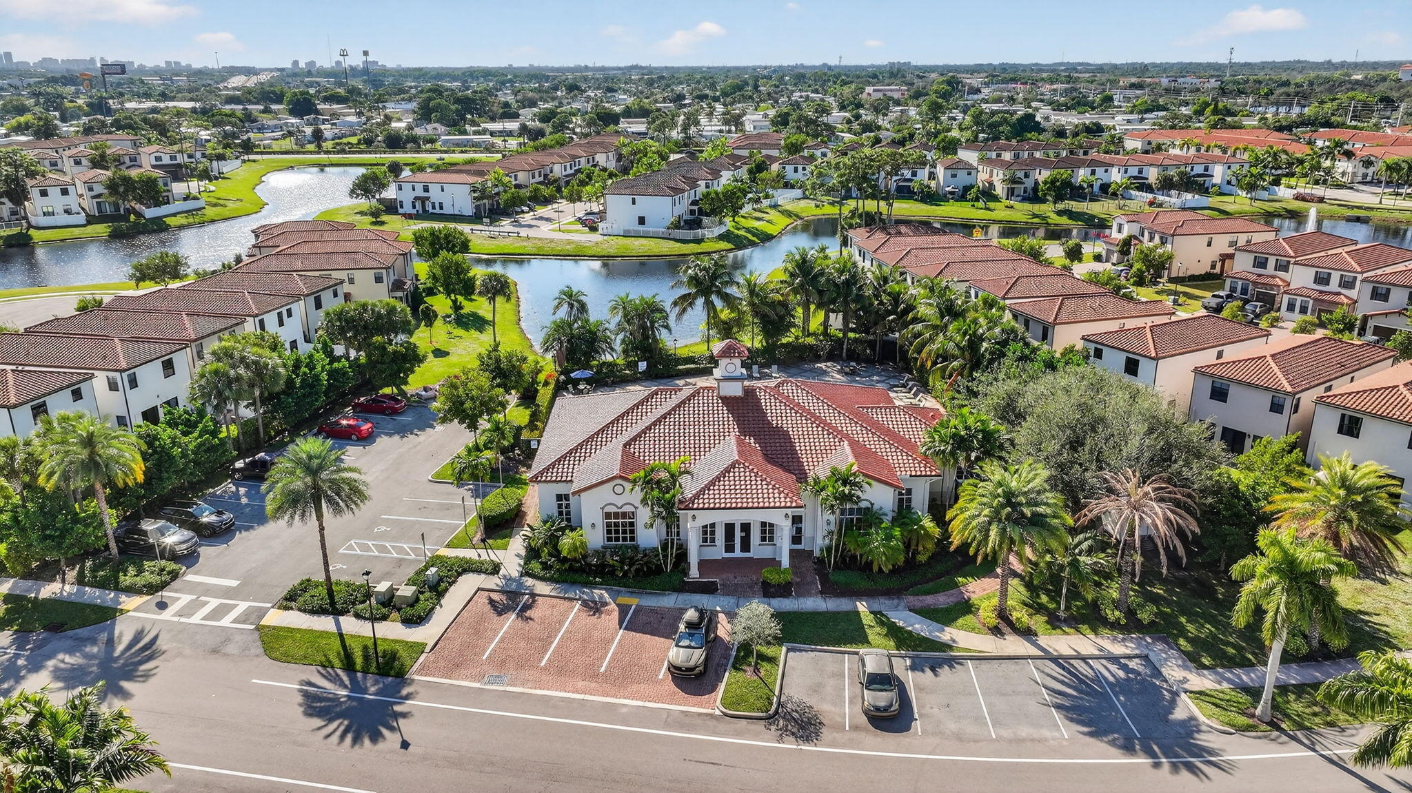 1011 Willow Place Riviera Beach, FL 33410 - Photo 36 of 65 an aerial view of residential houses with outdoor space and lake view