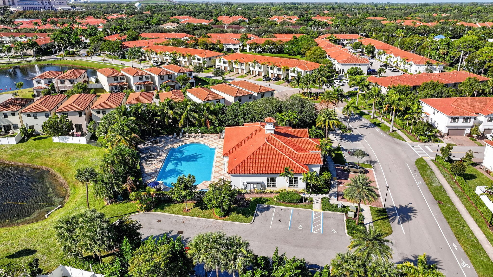 1011 Willow Place Riviera Beach, FL 33410 - Photo 44 of 65 an aerial view of residential houses with outdoor space and parking
