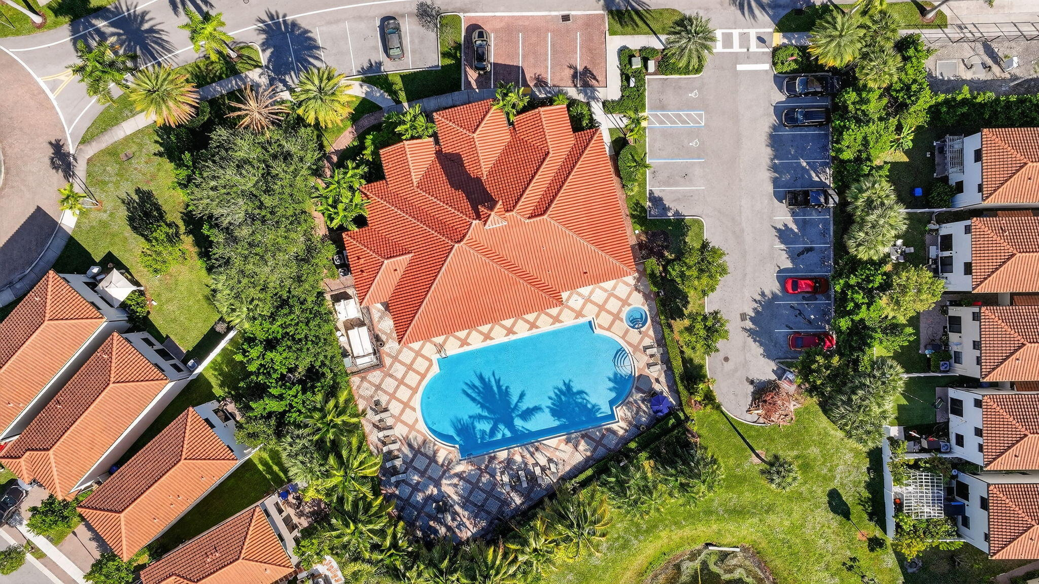 1011 Willow Place Riviera Beach, FL 33410 - Photo 45 of 65 an aerial view of a house a garden and swimming pool