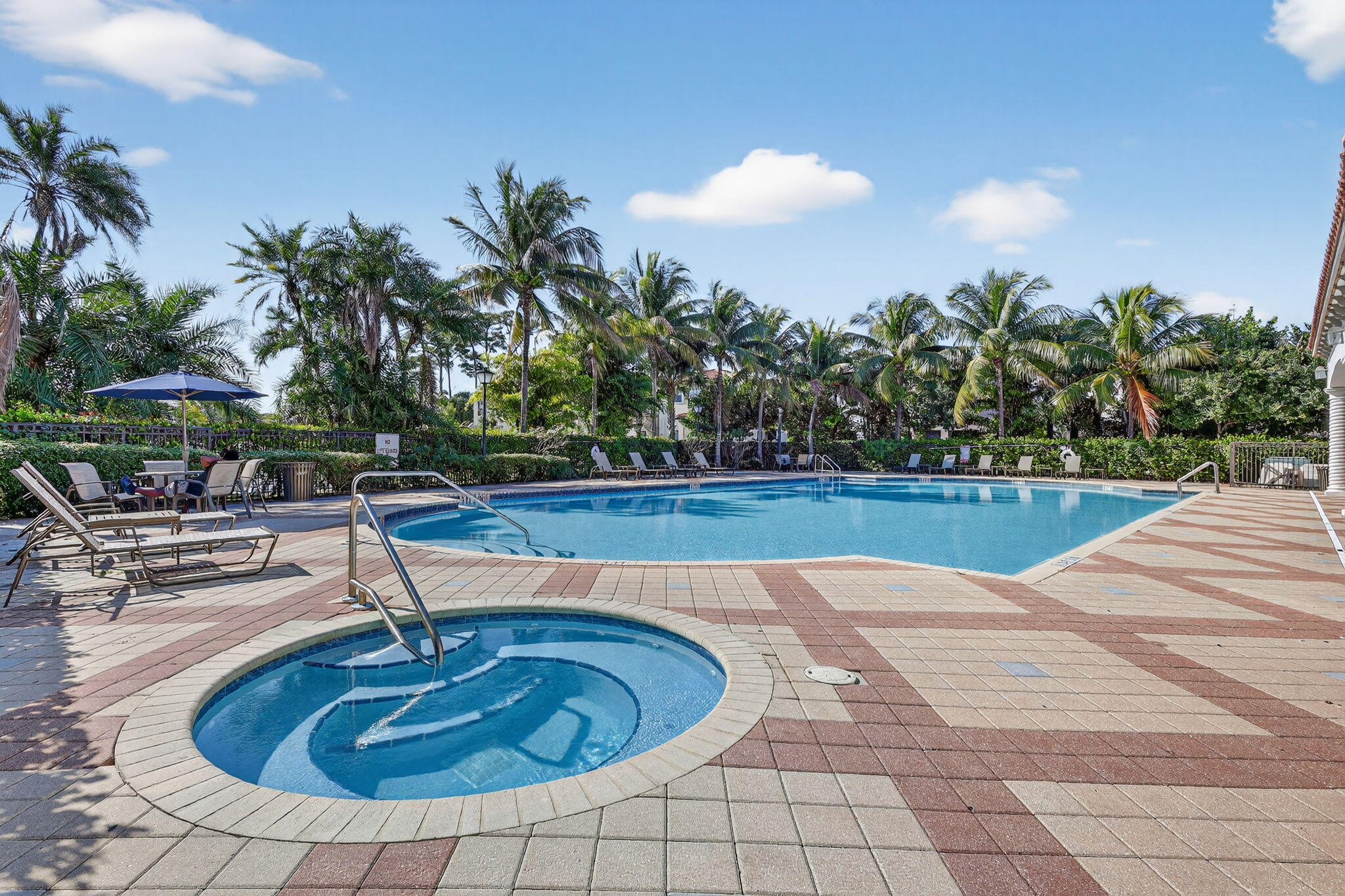 1011 Willow Place Riviera Beach, FL 33410 - Photo 50 of 65 a view of swimming pool with seating space