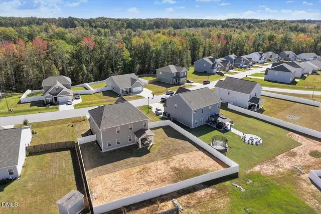 view of living room with furniture and a window