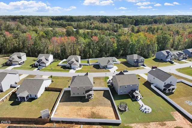 a view of a lake with couches and city view
