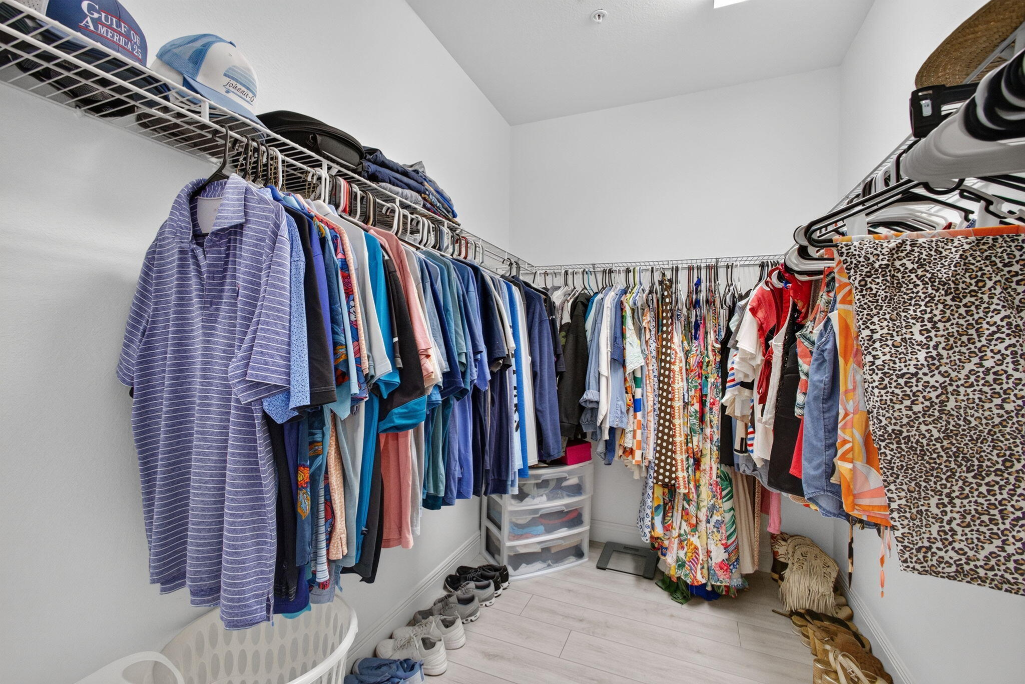 9523 Southwest Merlin Court Stuart, FL 34997 - Photo 28 of 43 PRIMARY WALK-IN CLOSET