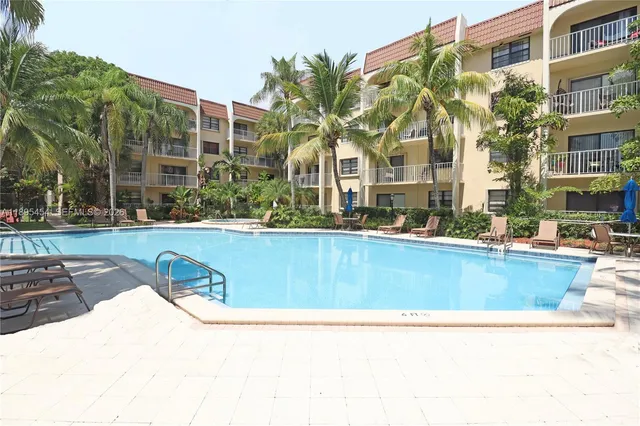 a view of outdoor space and swimming pool