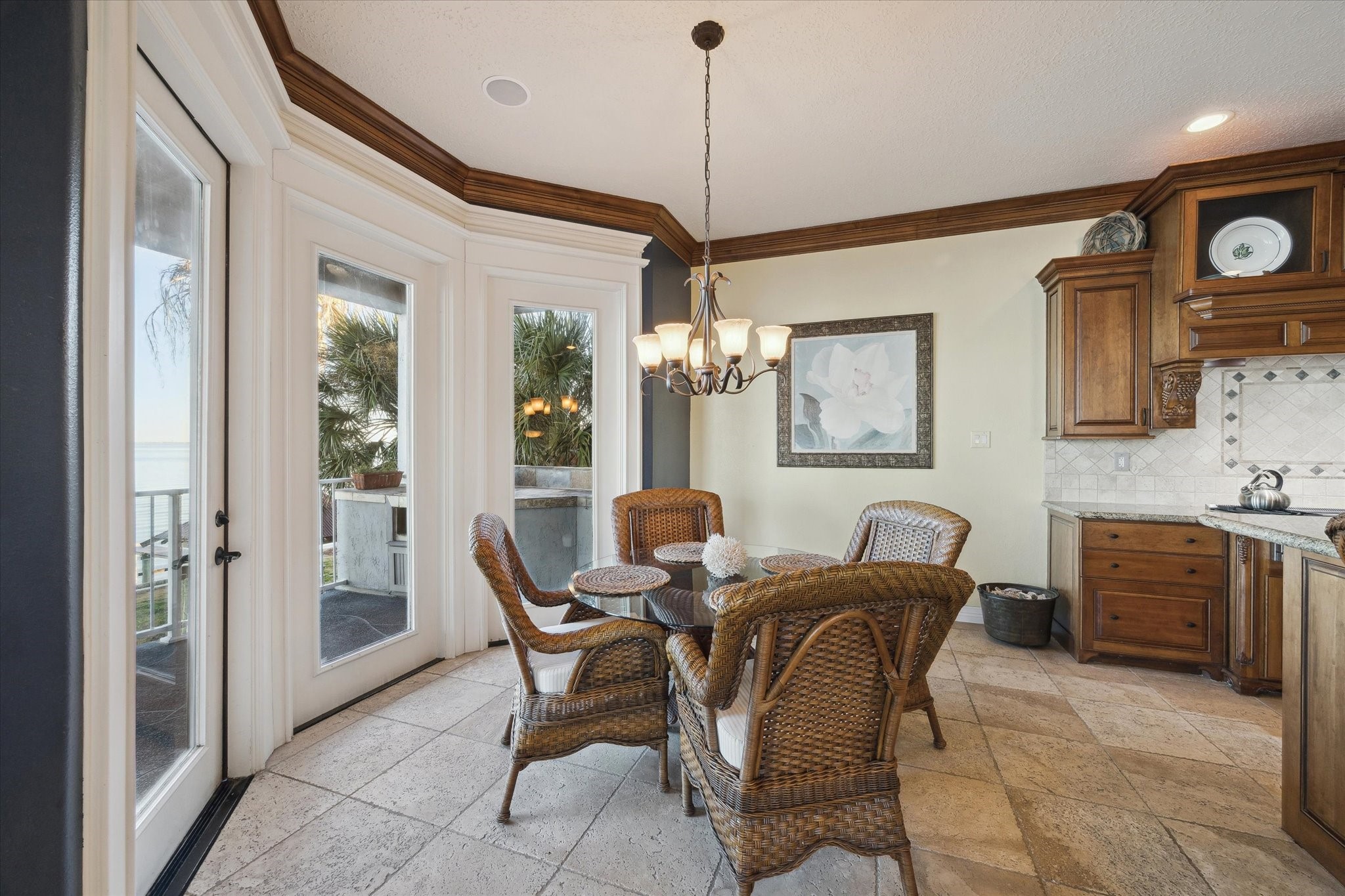 1406 Todville Road Seabrook, TX 77586 - Photo 21 of 50 BREAKFAST ROOM ALSO FEATURES AN ATRIUM DOOR OPENING TO THE BALCONY.