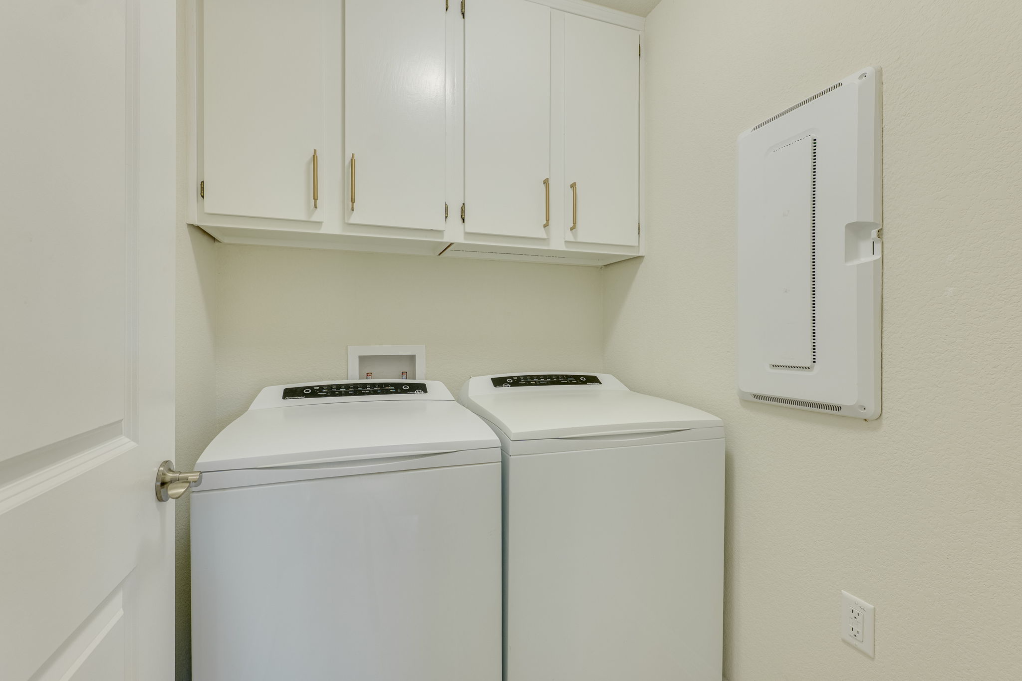 509 Rockport Street Georgetown, TX 78633 - Photo 17 of 27 Laundry room with luxury Fisher & Paykel washer and dryer included