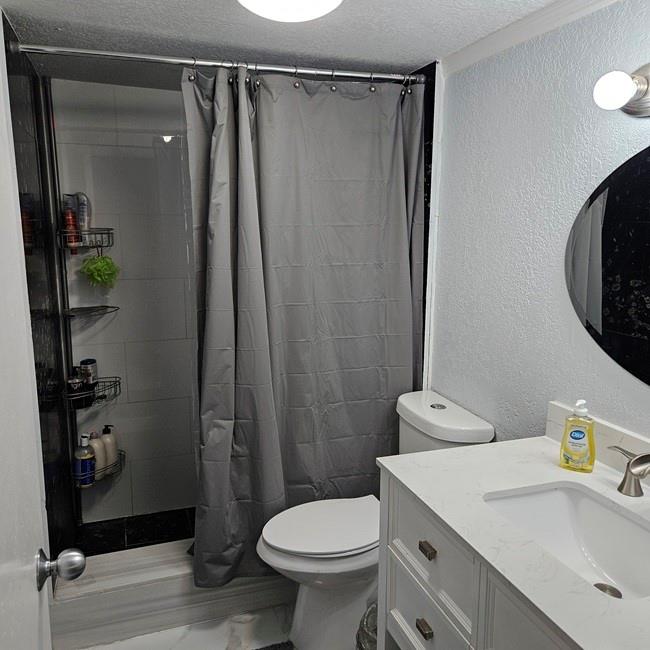 3270 North Pine Island Road, Unit 307 Sunrise, FL 33351 - Photo 15 of 17 a bathroom with a sink a toilet and shower