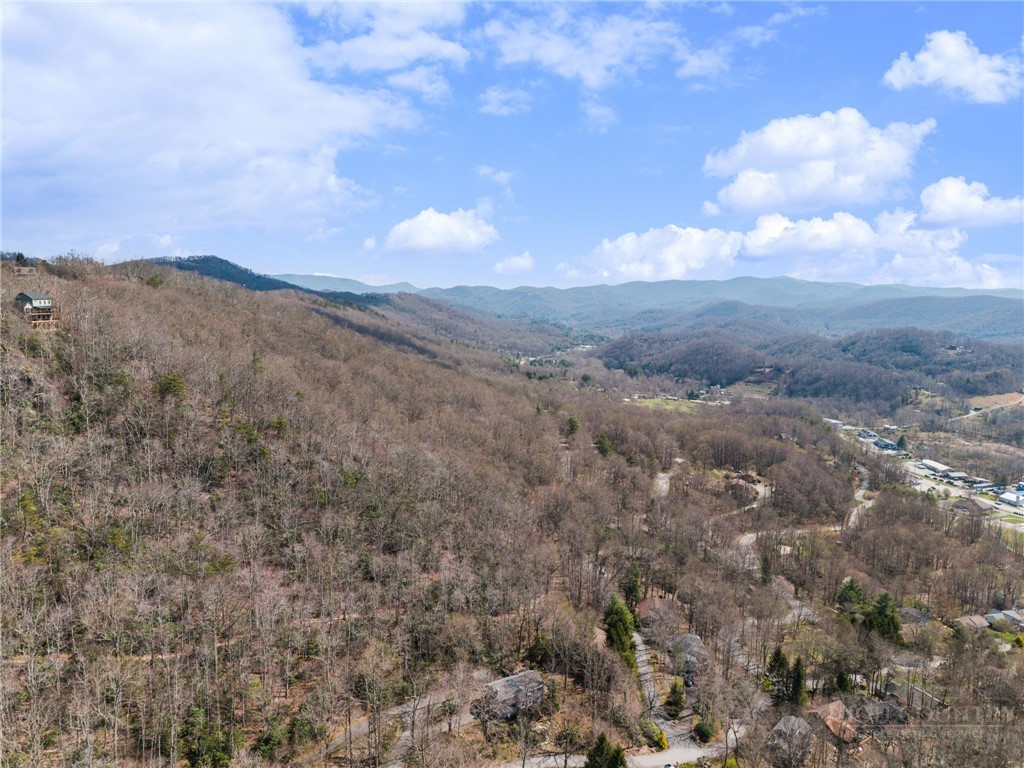 220 Woodwinds Lane Seven Devils, NC 28604 - Photo 42 of 46 a view of a city and mountains in the background