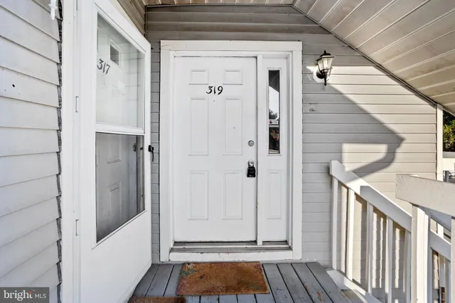 a view of front door door and porch