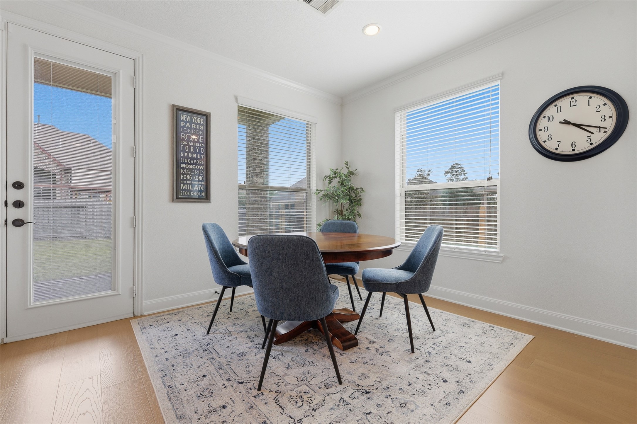 6835 Preston Grove Drive Spring, TX 77389 - Photo 20 of 49 a view of a dining room with furniture window and wooden floor