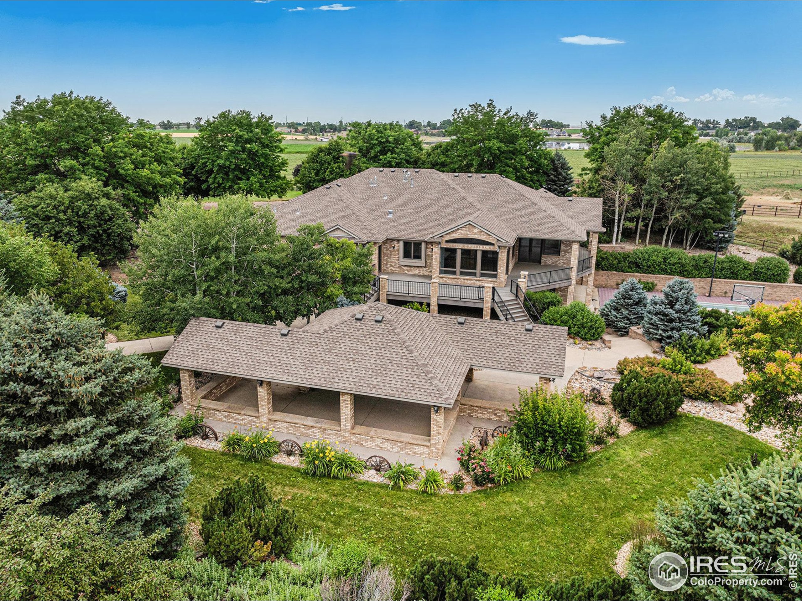 796 Abrams Way Berthoud, CO 80513 - Photo 29 of 40 an aerial view of a house with a yard
