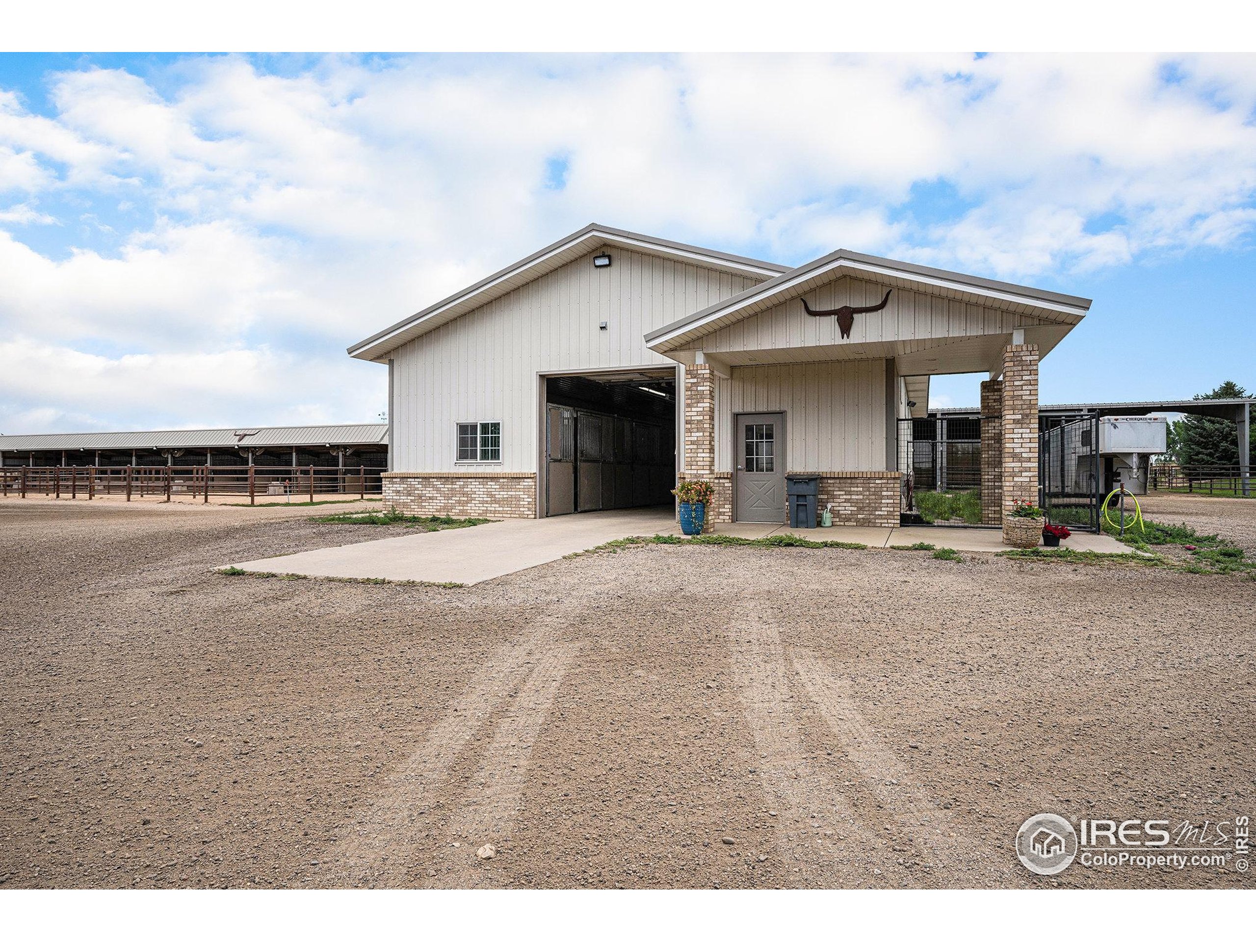 796 Abrams Way Berthoud, CO 80513 - Photo 30 of 40 a view of a house with backyard