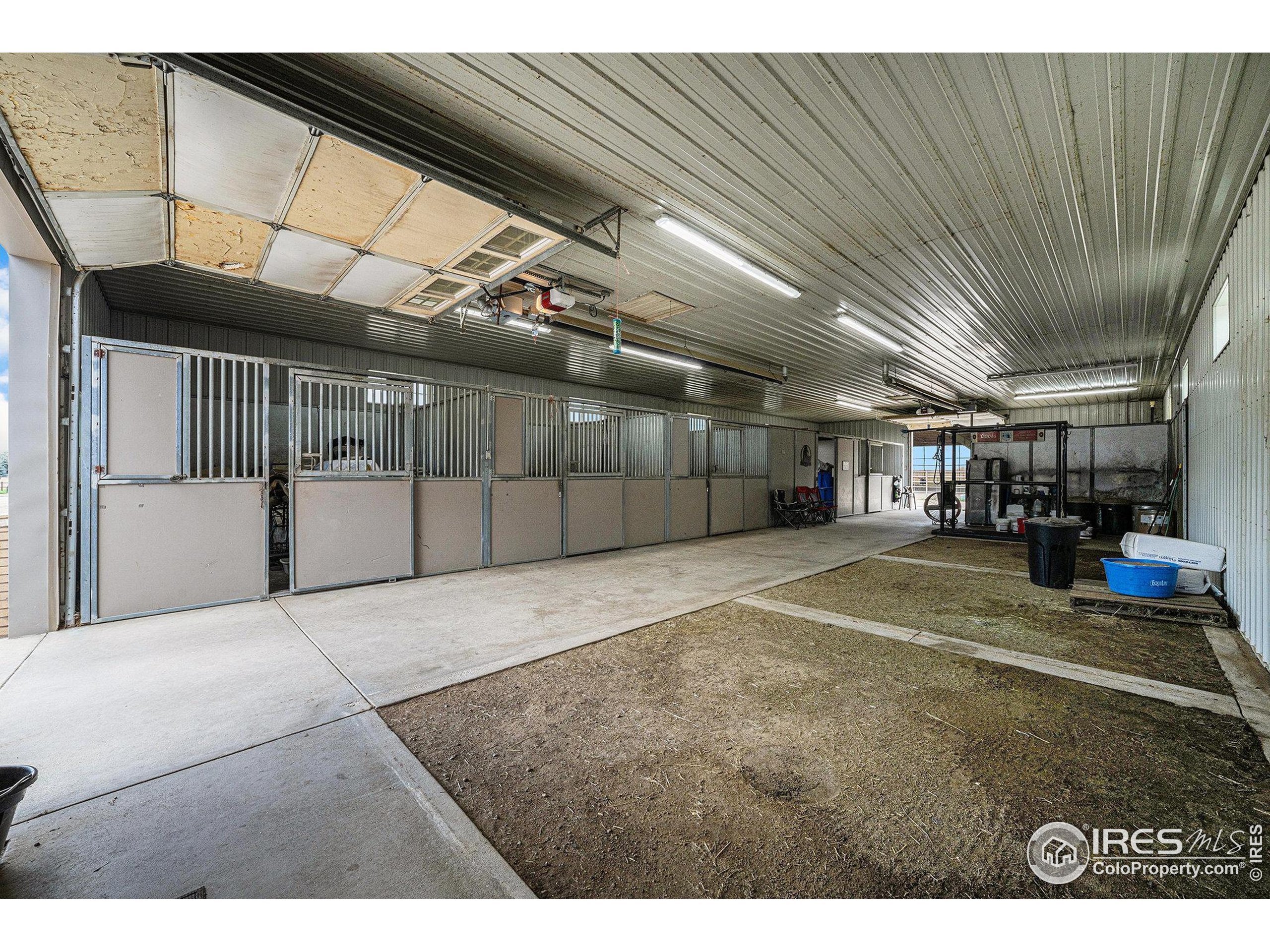 796 Abrams Way Berthoud, CO 80513 - Photo 32 of 40 a view of an empty room with a garage