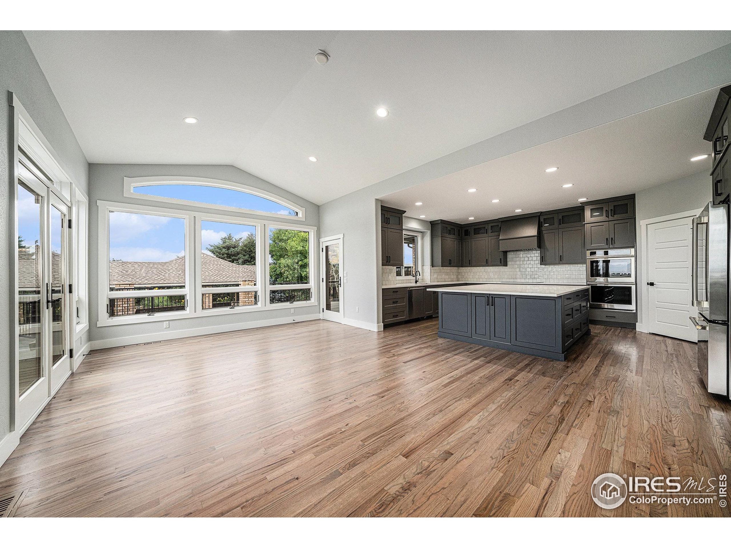 796 Abrams Way Berthoud, CO 80513 - Photo 6 of 40 a view of kitchen with wooden floor