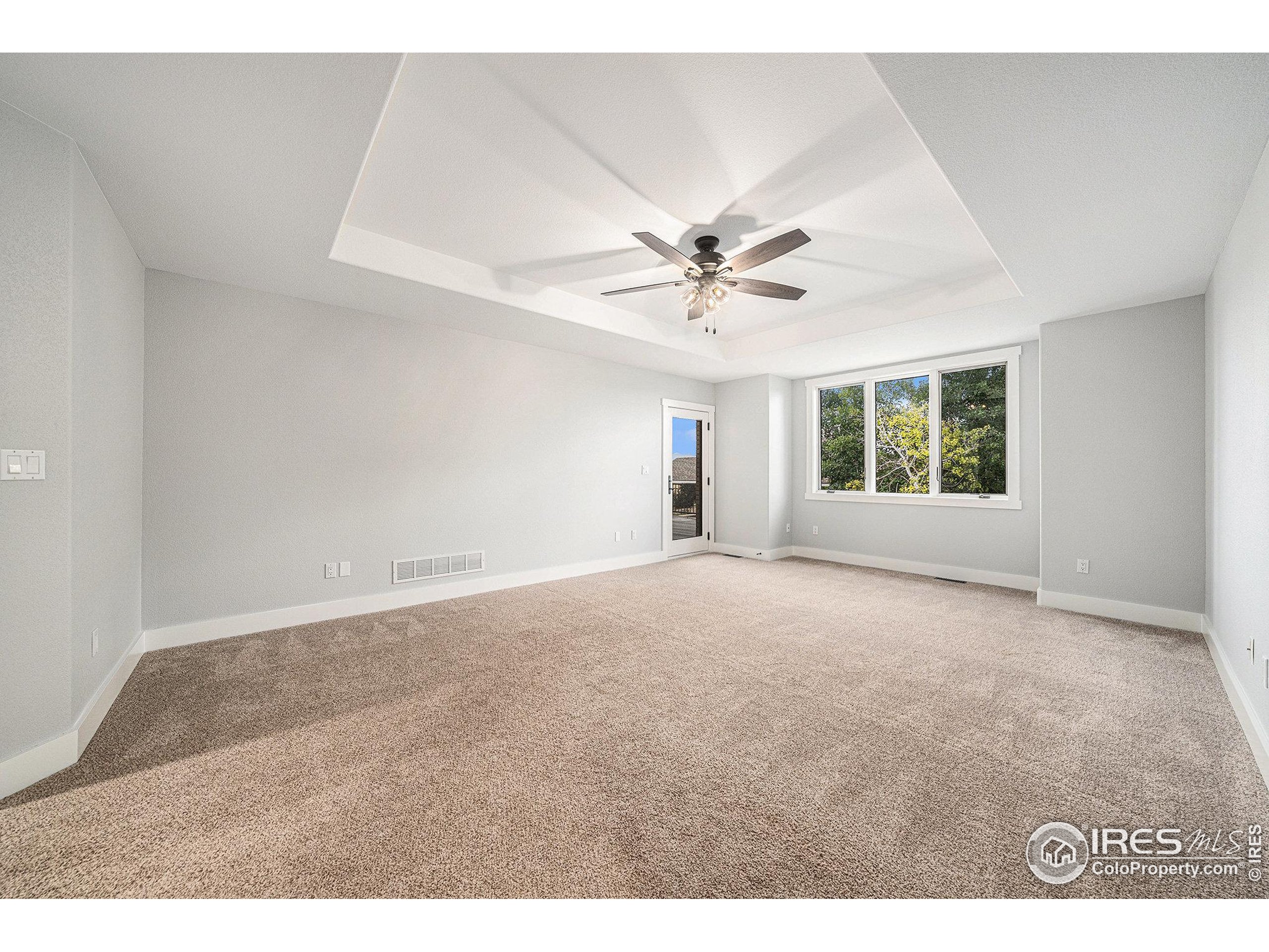 796 Abrams Way Berthoud, CO 80513 - Photo 10 of 40 a view of an empty room with a window