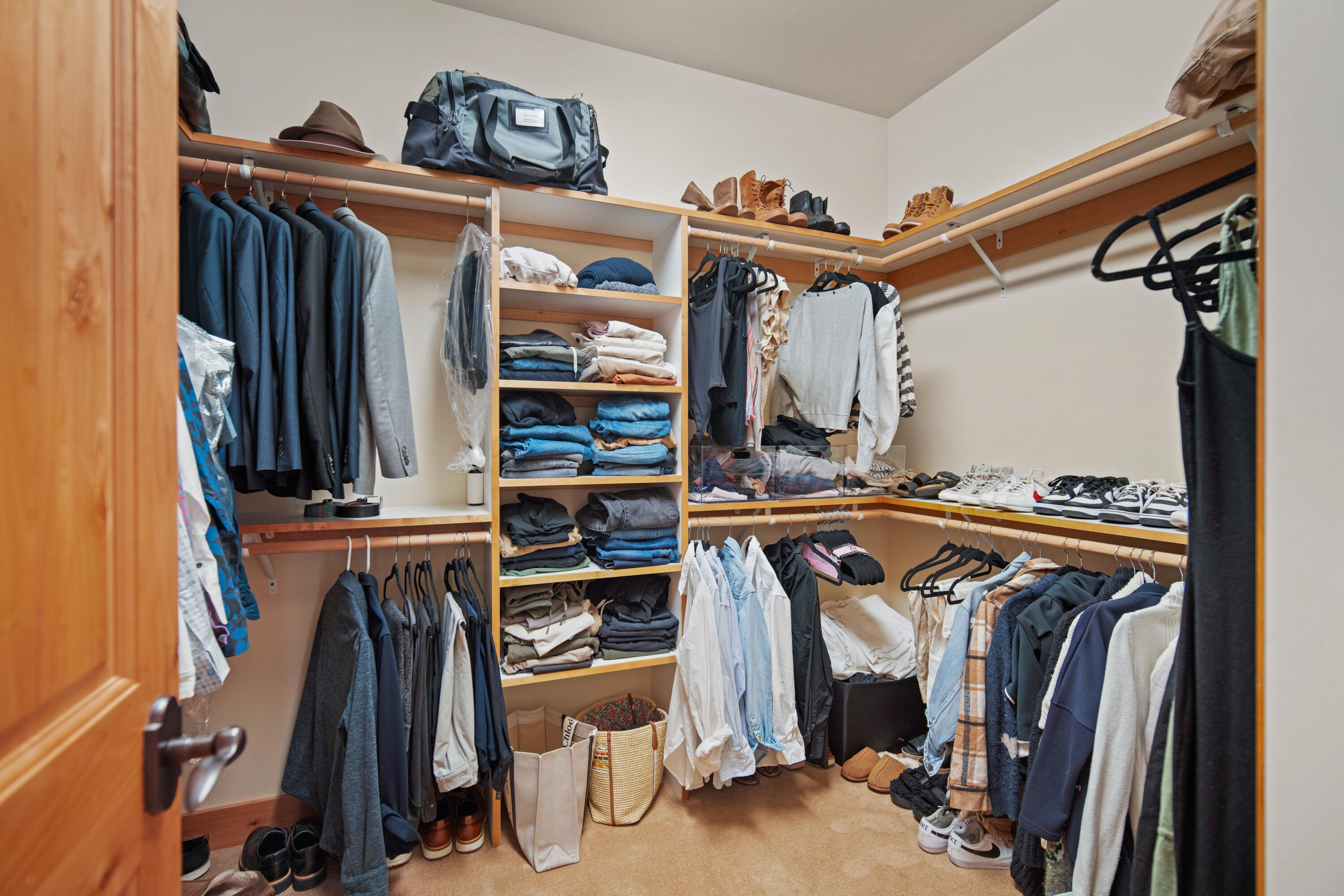 56689 Dancing Rock Loop Bend, OR 97707 - Photo 26 of 51 a view of walk in closet with clothes