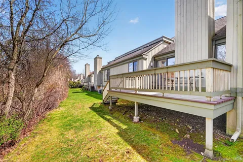 a view of yard with a play house
