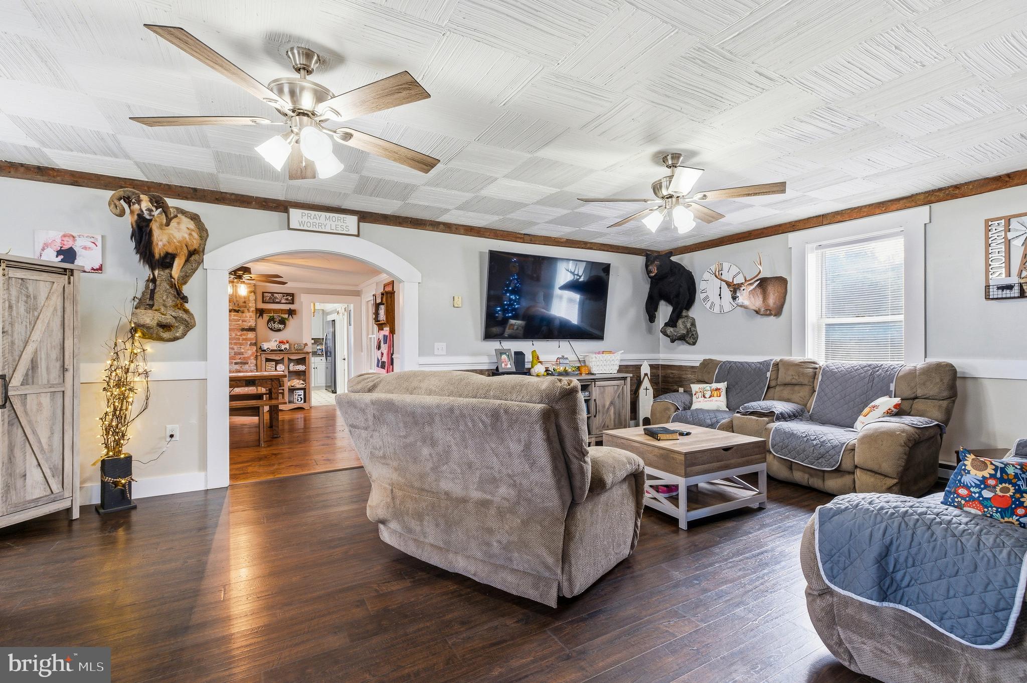 214 Chapel Road Stanley, VA 22851 - Photo 14 of 74 a living room with furniture and wooden floor