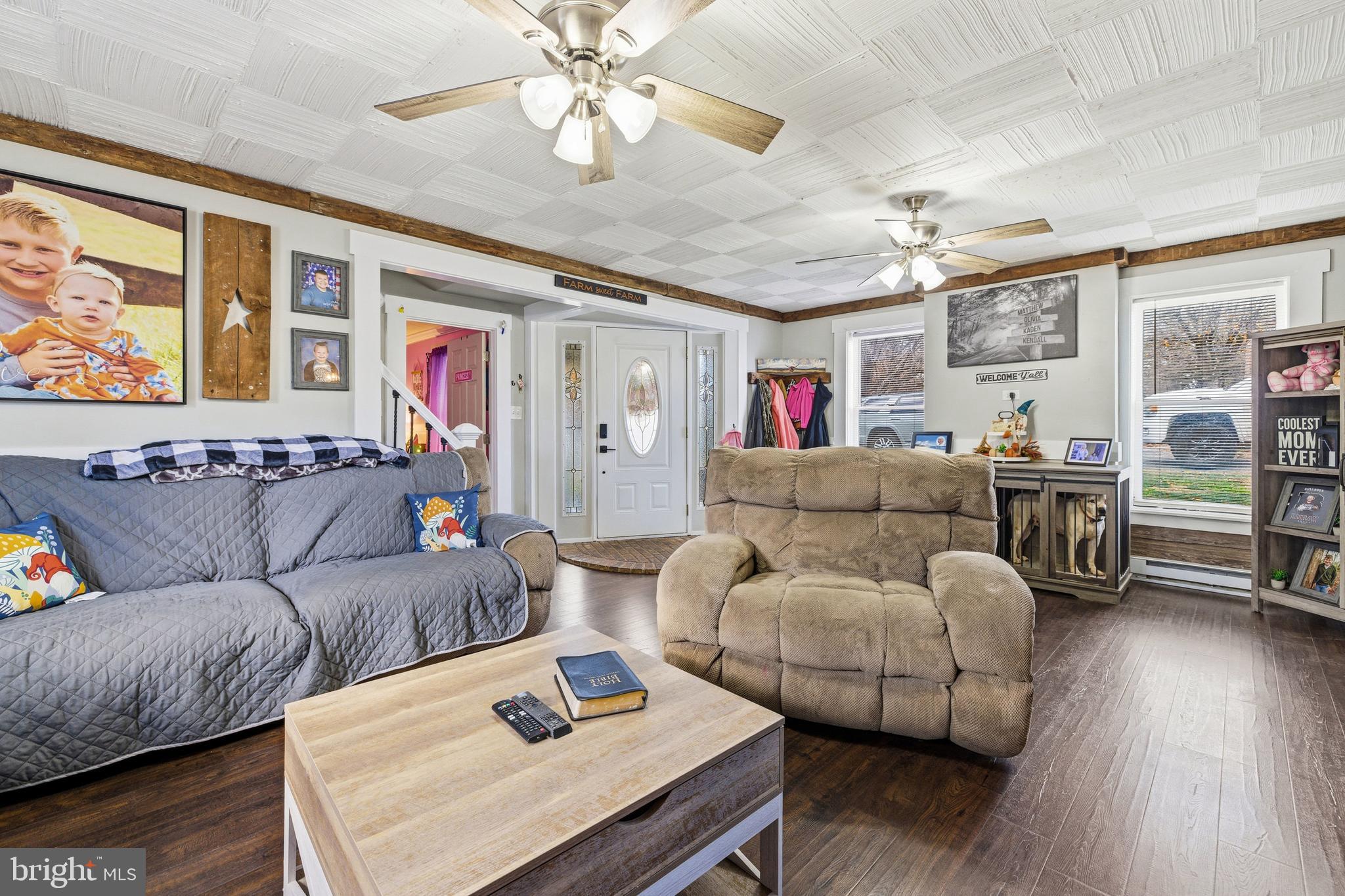214 Chapel Road Stanley, VA 22851 - Photo 15 of 74 a living room with furniture and wooden floor