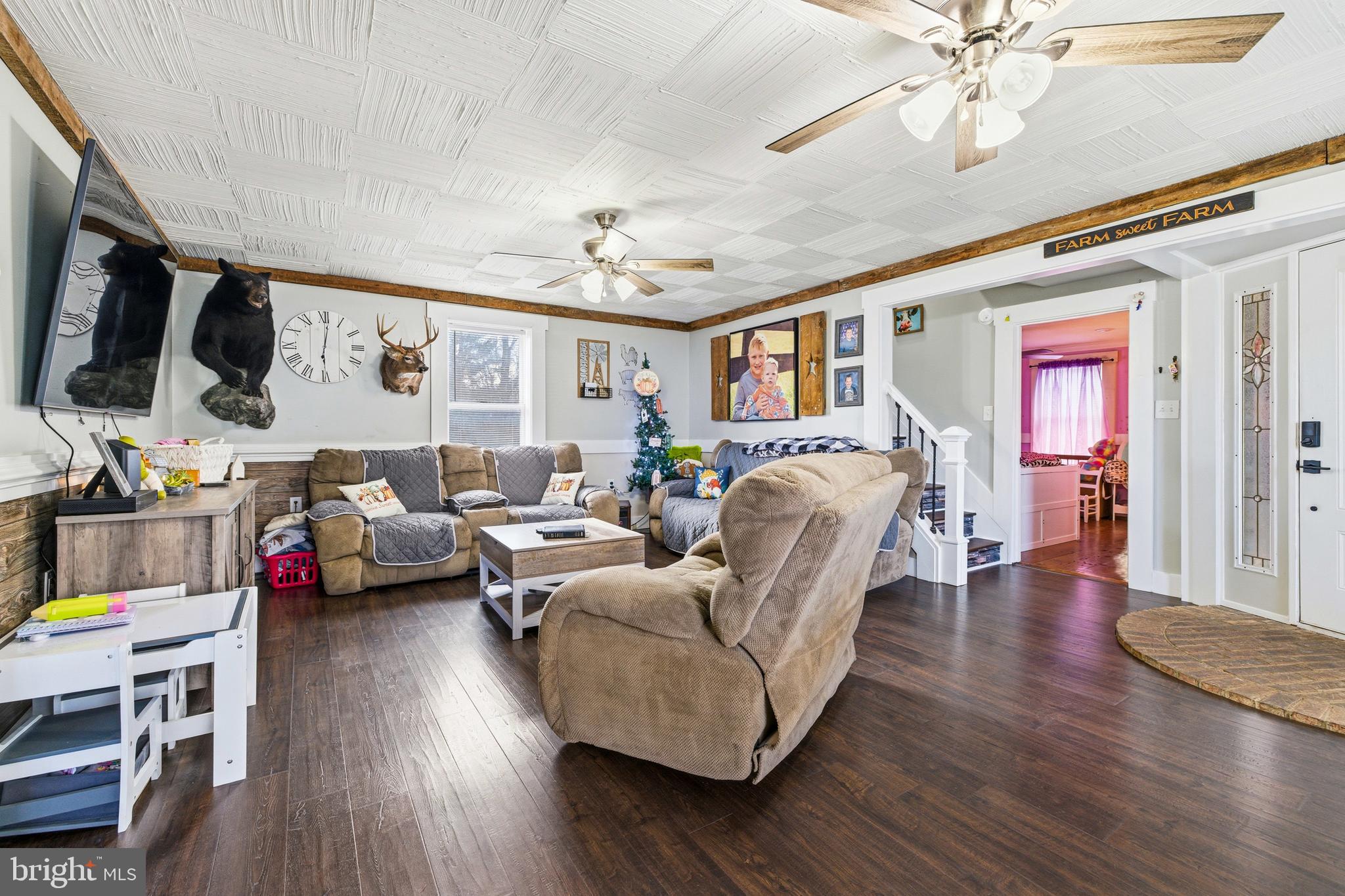 214 Chapel Road Stanley, VA 22851 - Photo 16 of 74 a living room with furniture and a flat screen tv