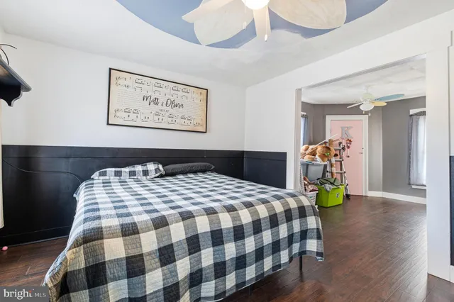 a view of a house with a yard patio and fire pit