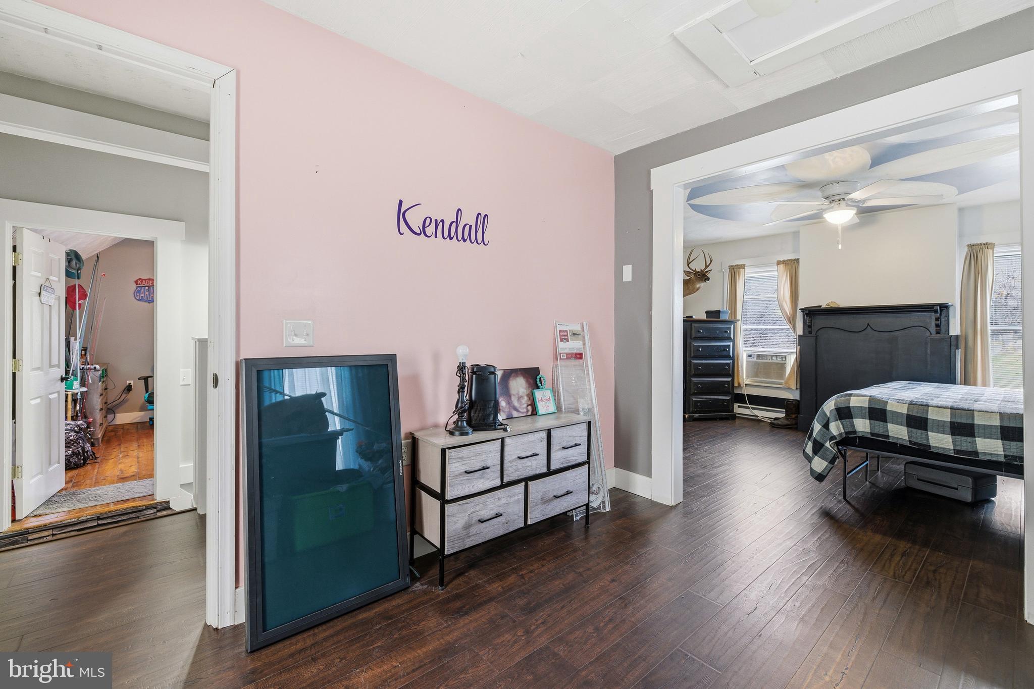 214 Chapel Road Stanley, VA 22851 - Photo 37 of 74 a bedroom with furniture and a wooden floor