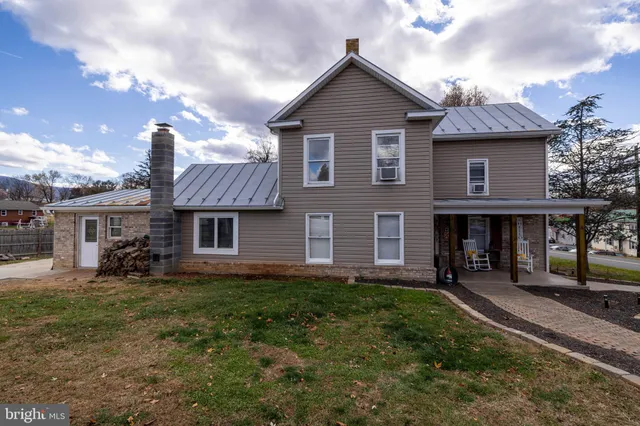 a view of swimming pool with seating area