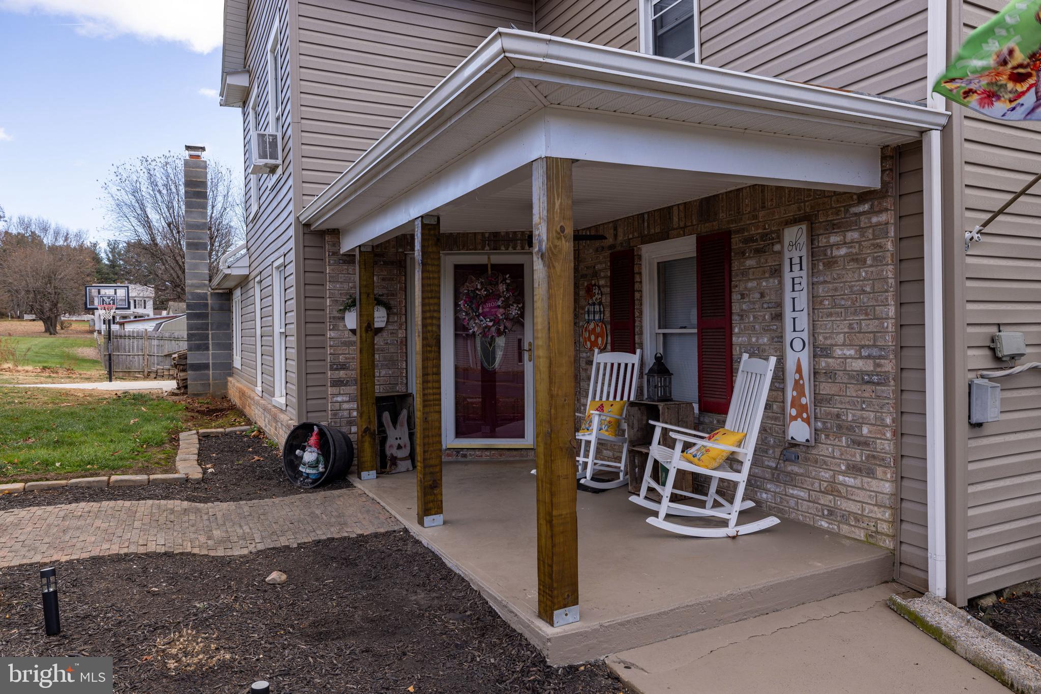 214 Chapel Road Stanley, VA 22851 - Photo 42 of 74 a view of a patio with table and chairs and a barbeque