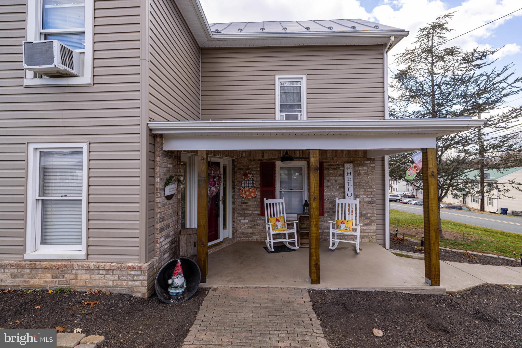 214 Chapel Road Stanley, VA 22851 - Photo 43 of 74 a front view of a house with a porch