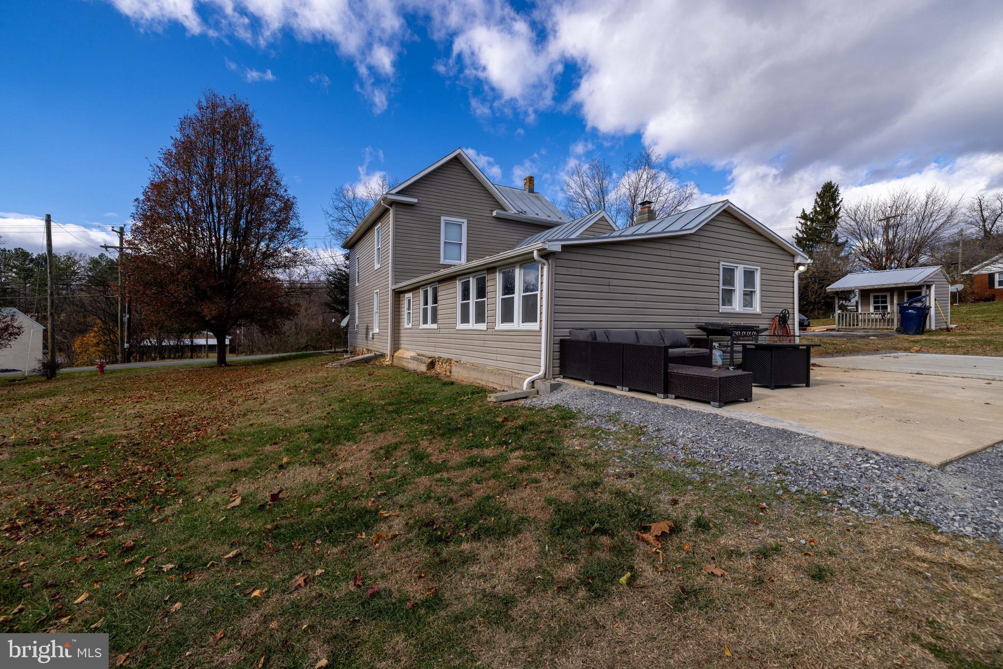214 Chapel Road Stanley, VA 22851 - Photo 50 of 74 a view of a house with a yard