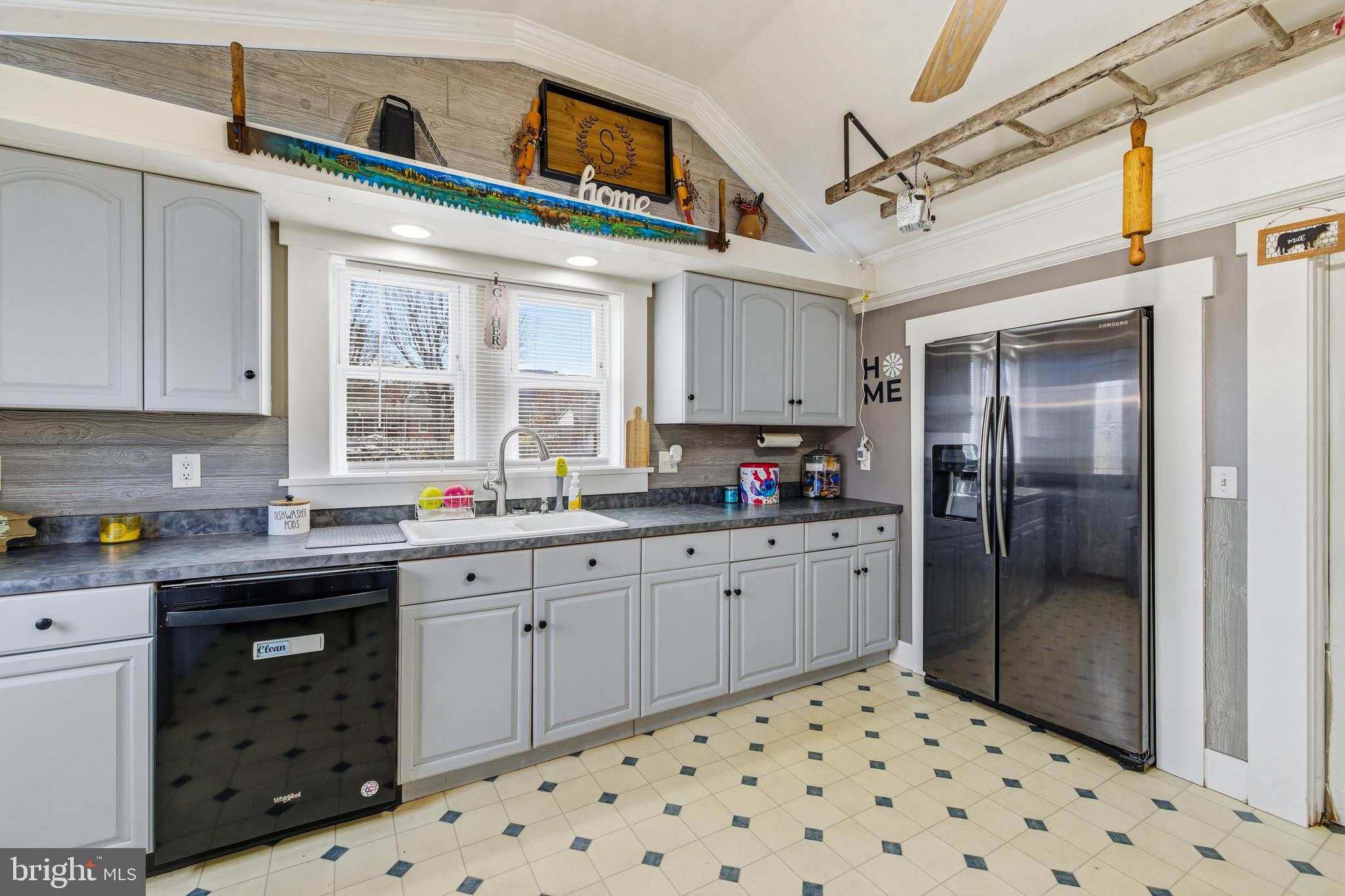 214 Chapel Road Stanley, VA 22851 - Photo 8 of 74 a kitchen with sink cabinets and window