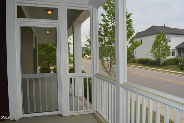 a view of a porch of a house