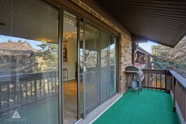 a view of a porch with furniture