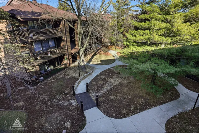 a view of a street with a building in the background