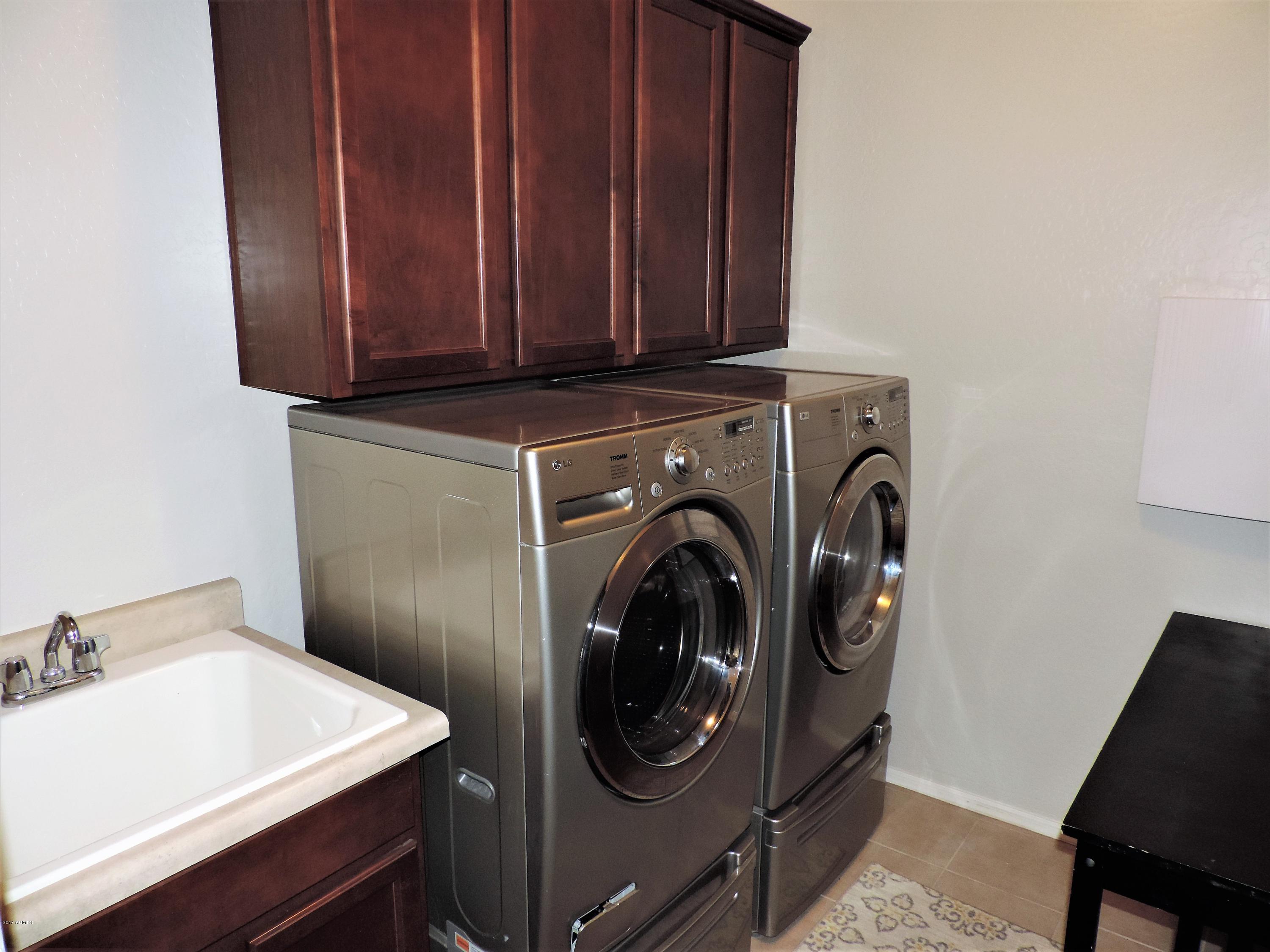 2969 East Isaiah Avenue Gilbert, AZ 85298 - Photo 25 of 34 Utility Rm Cabinets & Sink