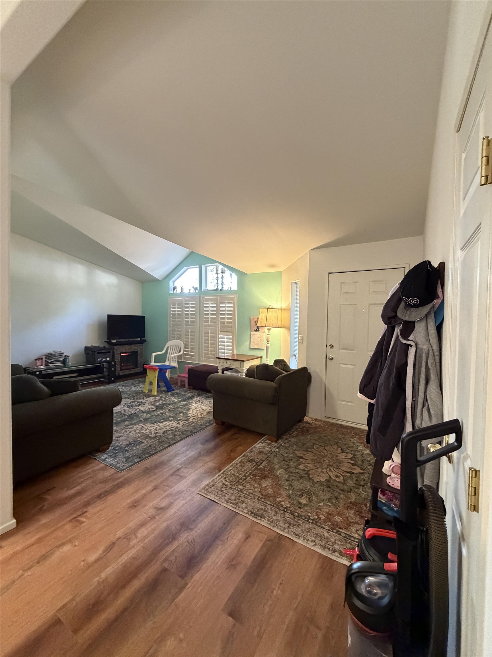 10100 Pioneer Trail, Unit 76 Reno, NV 89503 - Photo 11 of 22 a living room with furniture and a flat screen tv