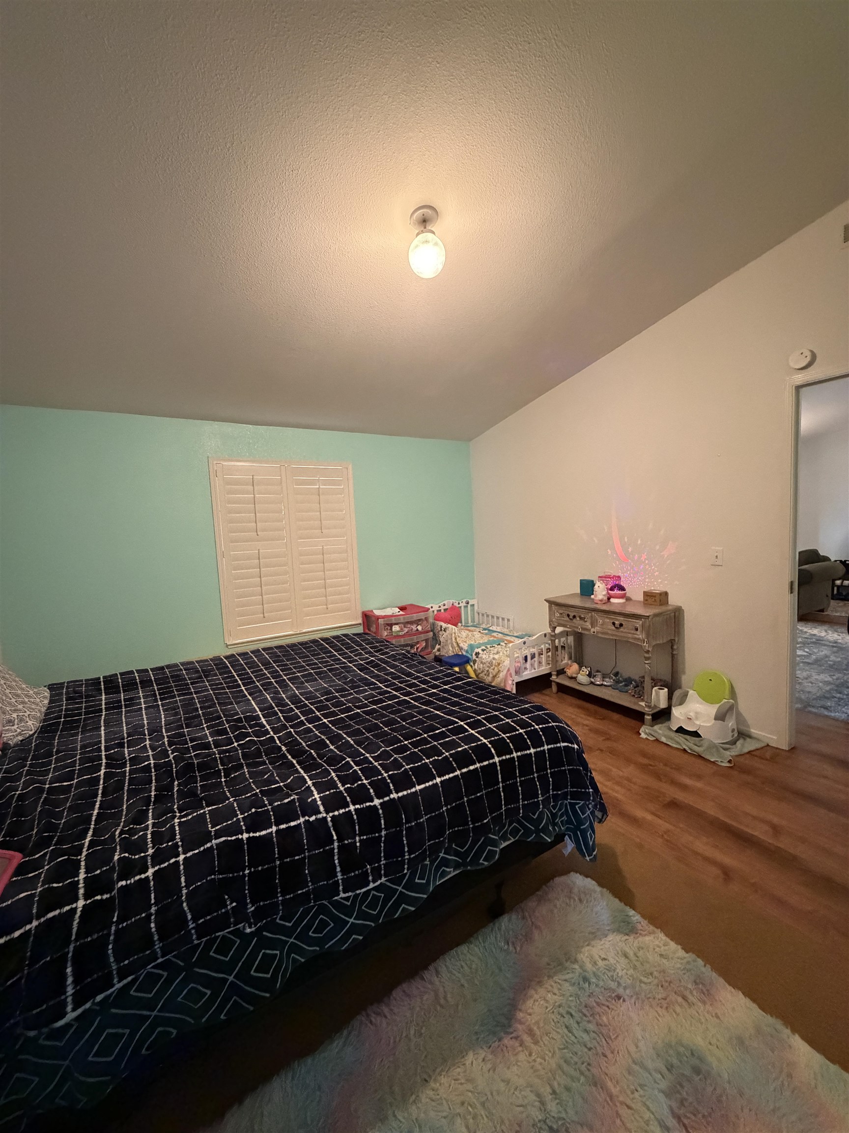 10100 Pioneer Trail, Unit 76 Reno, NV 89503 - Photo 18 of 22 a bedroom with bed and window