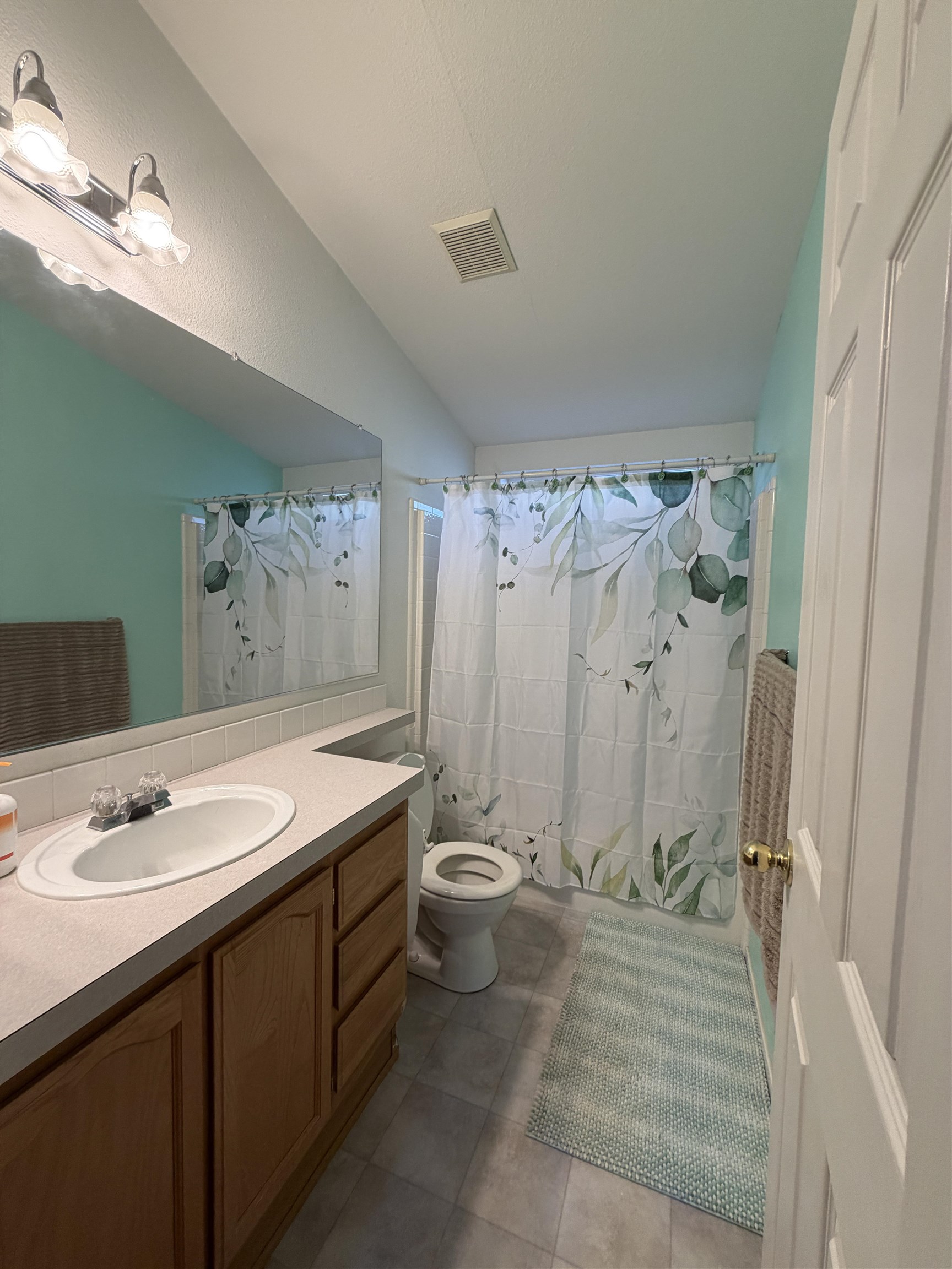 10100 Pioneer Trail, Unit 76 Reno, NV 89503 - Photo 22 of 22 a bathroom with a double vanity sink toilet and shower