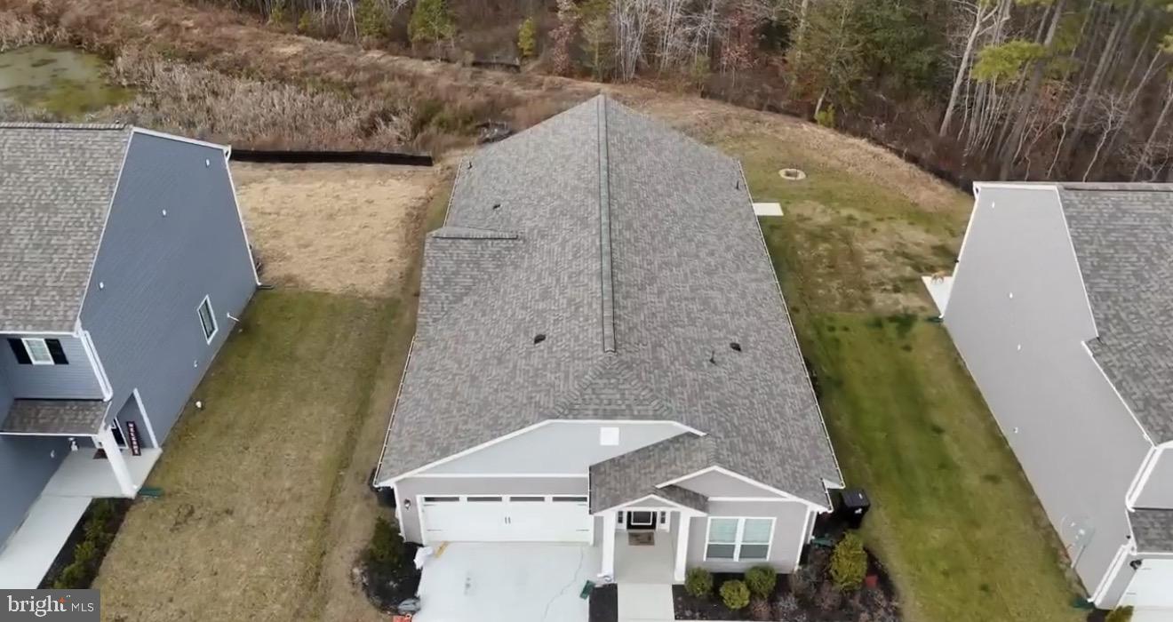 17305 George Ruffin Road Milford, VA 22514 - Photo 2 of 6 an aerial view of a house with a yard