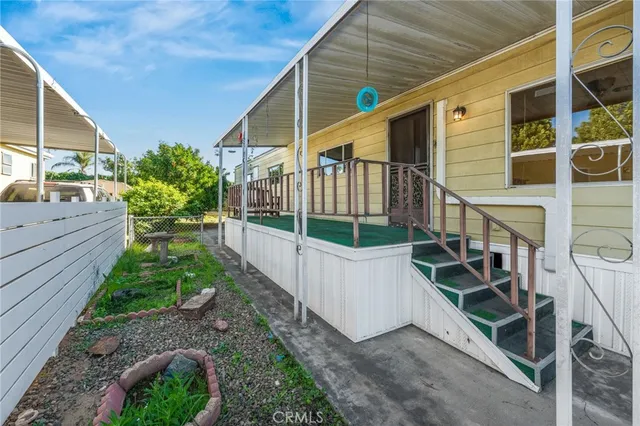 a view of deck with large windows