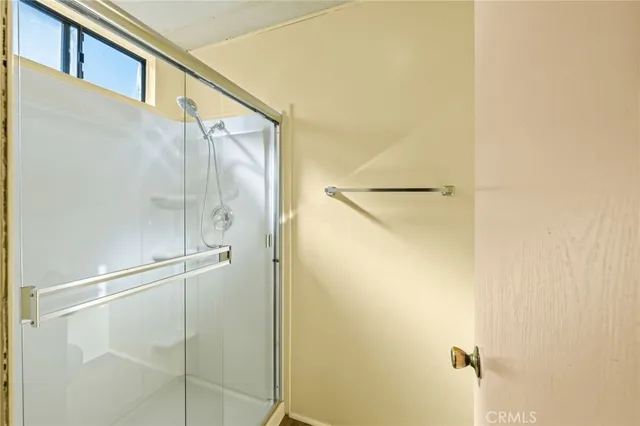 a bathroom with a sink mirror and vanity