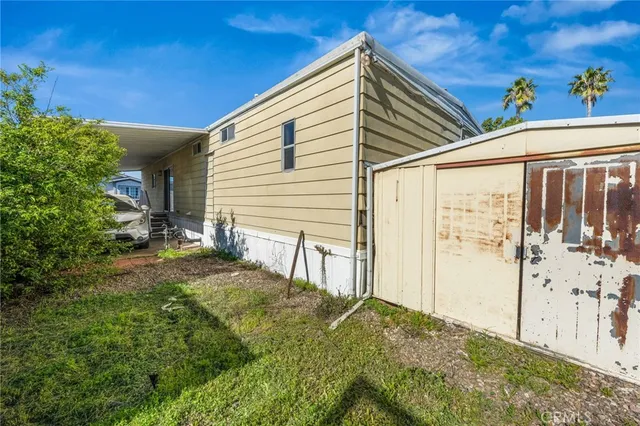 a view of a backyard with plants