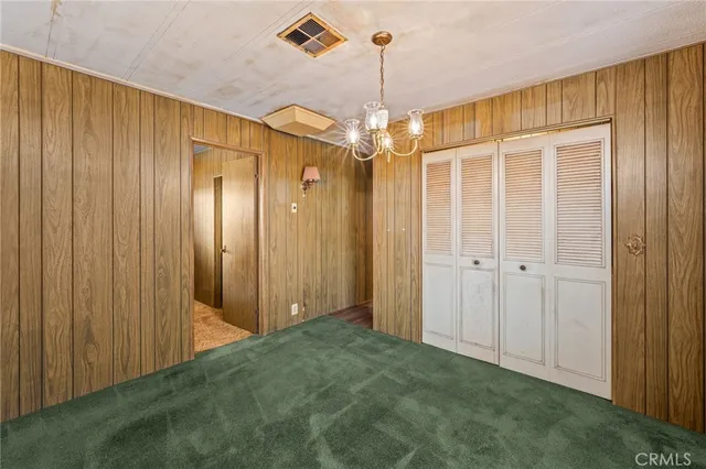 a bathroom with a shower and a glass door