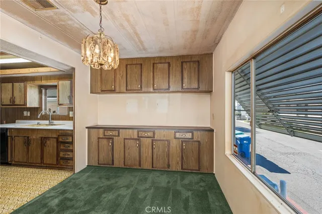 a view of a kitchen with a sink and dishwasher kitchen view