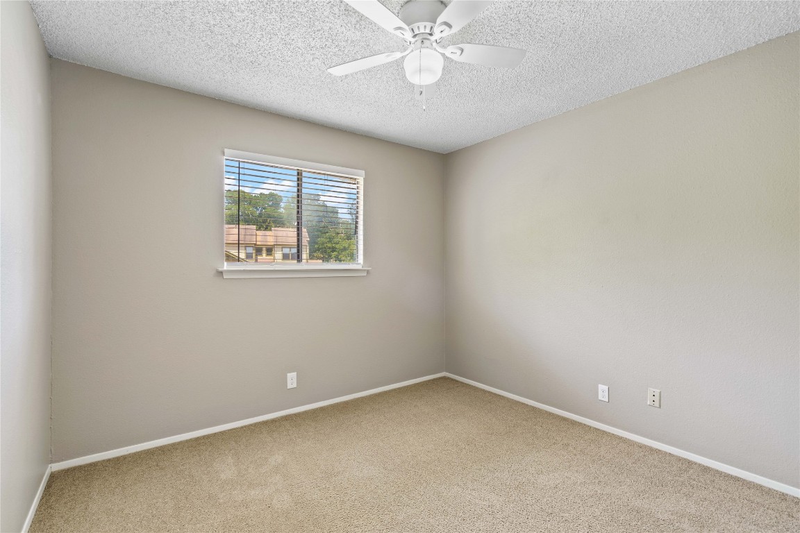 8005 Hood Circle, Unit B Austin, TX 78745 - Photo 11 of 18 an empty room with a window