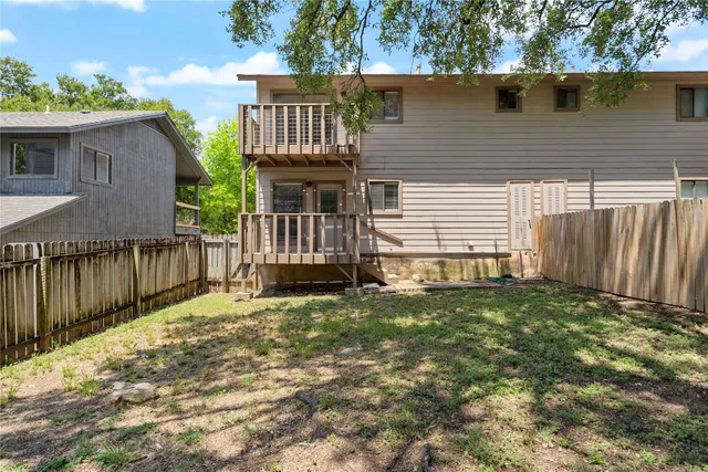 a view of a green field with lots of bushes
