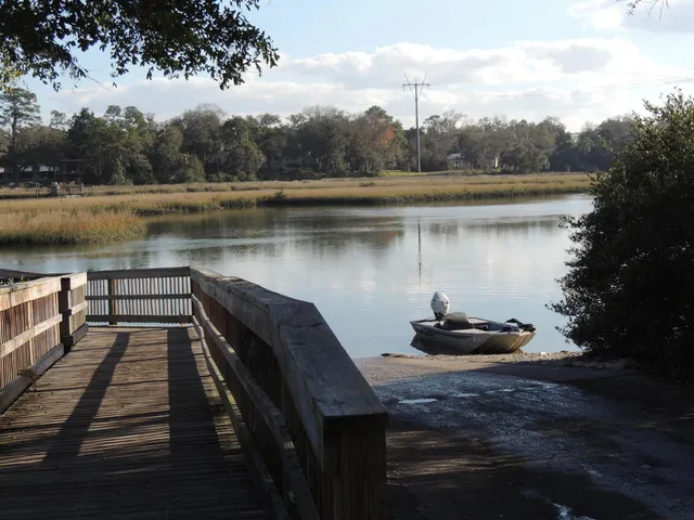 a lake view with a seating space
