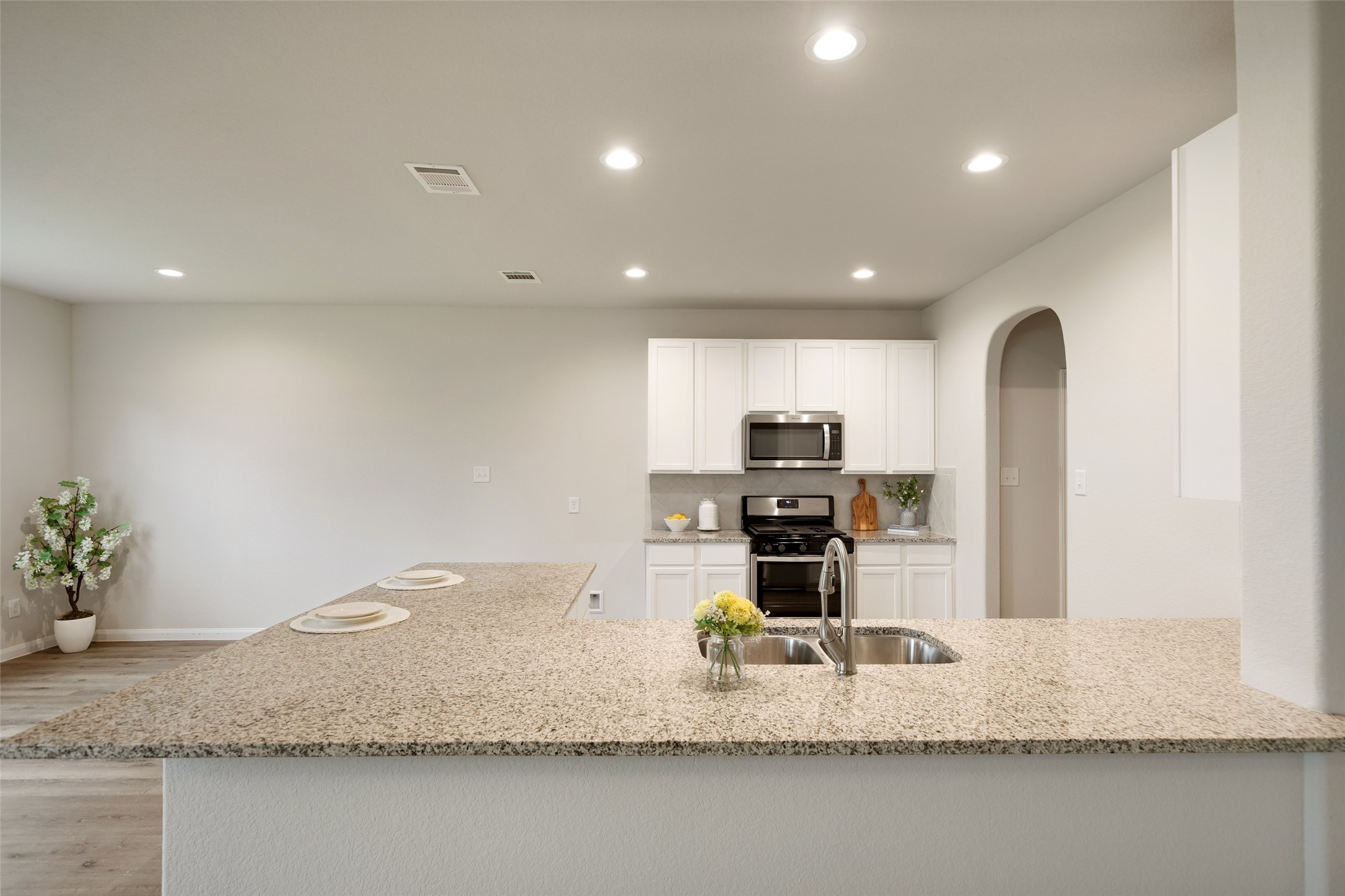 3628 Cub Drive Conroe, TX 77301 - Photo 10 of 32 Massive, granite kitchen island is fantastic for food preparation, entertaining presentation & additional seating for guests.