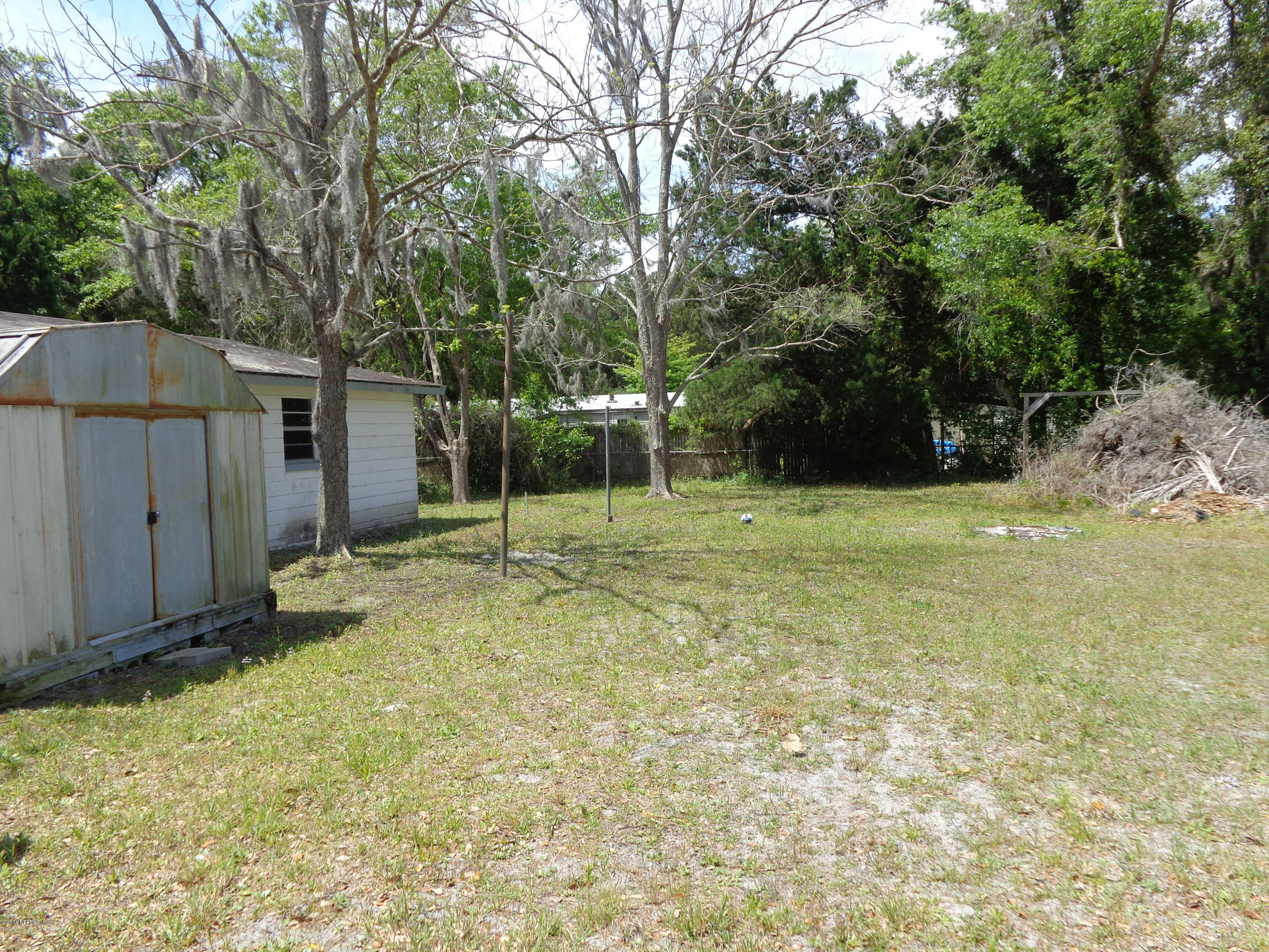 13294 Yellow Bluff Road Jacksonville, FL 32226 - Photo 16 of 21 a house with trees in the background